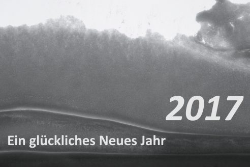 Foto Schnee auf Fenster mit Text Ein glückliches Neues Jahr 2017